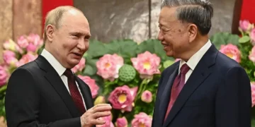 Putin vows deeper ties with Vietnam in visit criticised by US