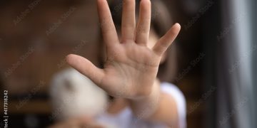 7-year-old stages protest at Maitighar, seeking justice in mother’s killing